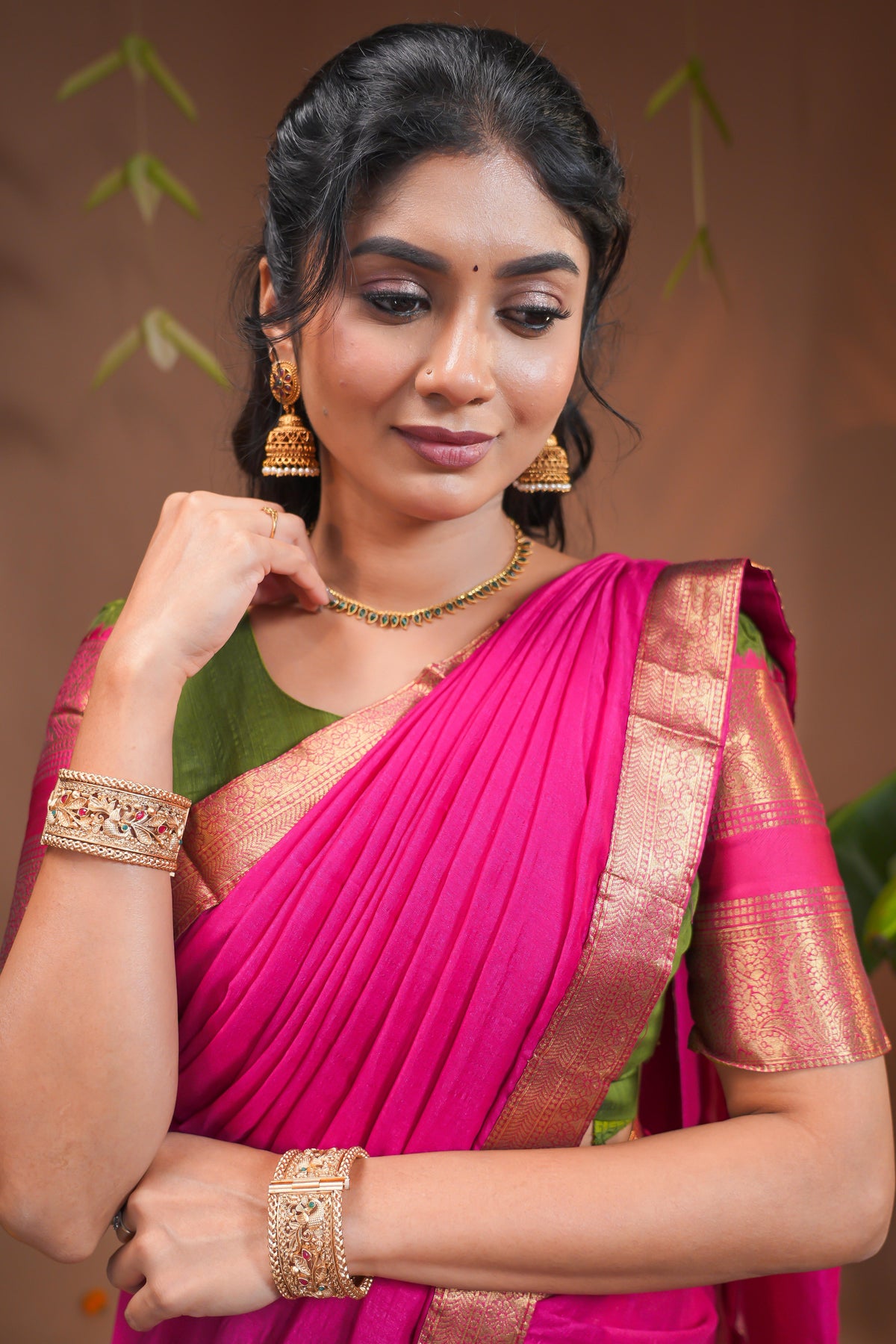Traditional Olive Green Lehengas and Vibrant Pink Silk Half Saree