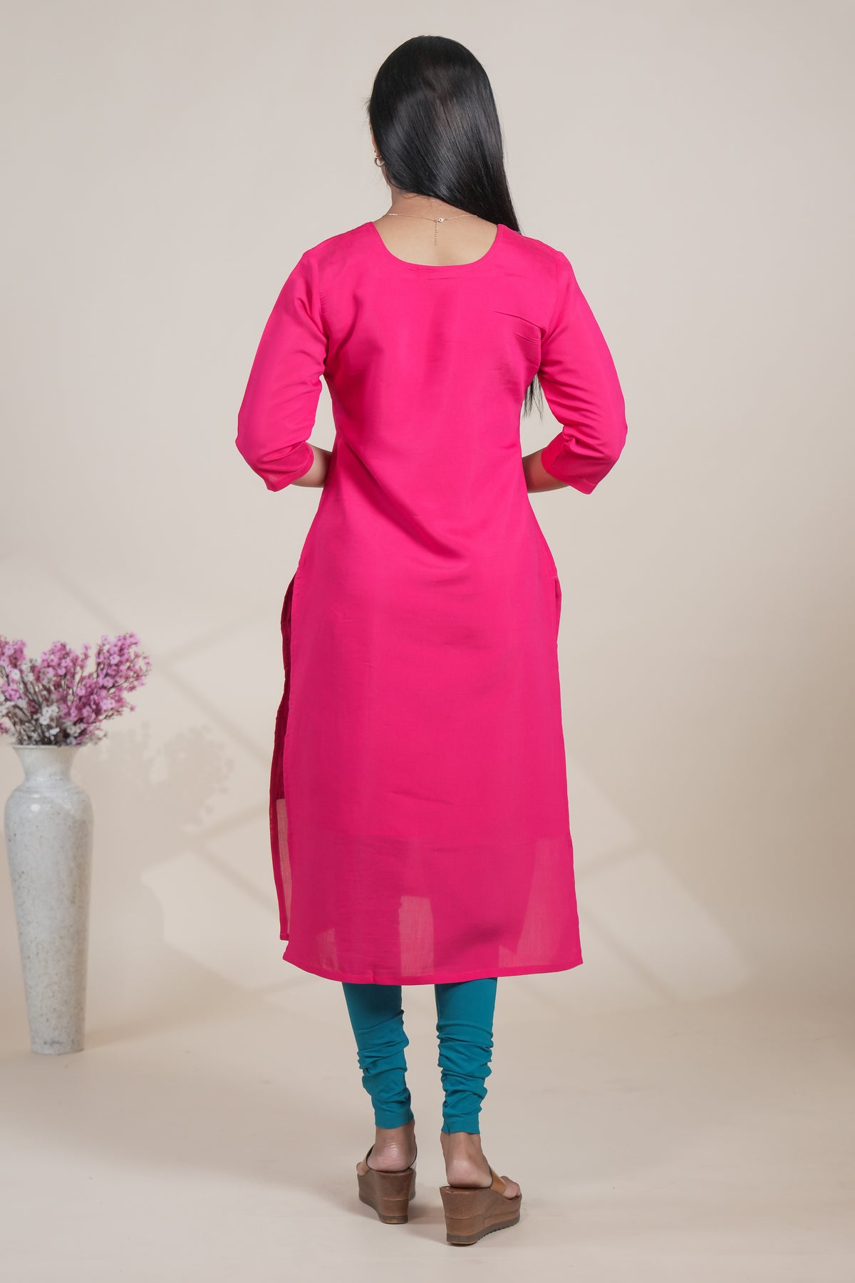 Vibrant Pink Straight Kurti featuring intricate floral embroidery open top single piece