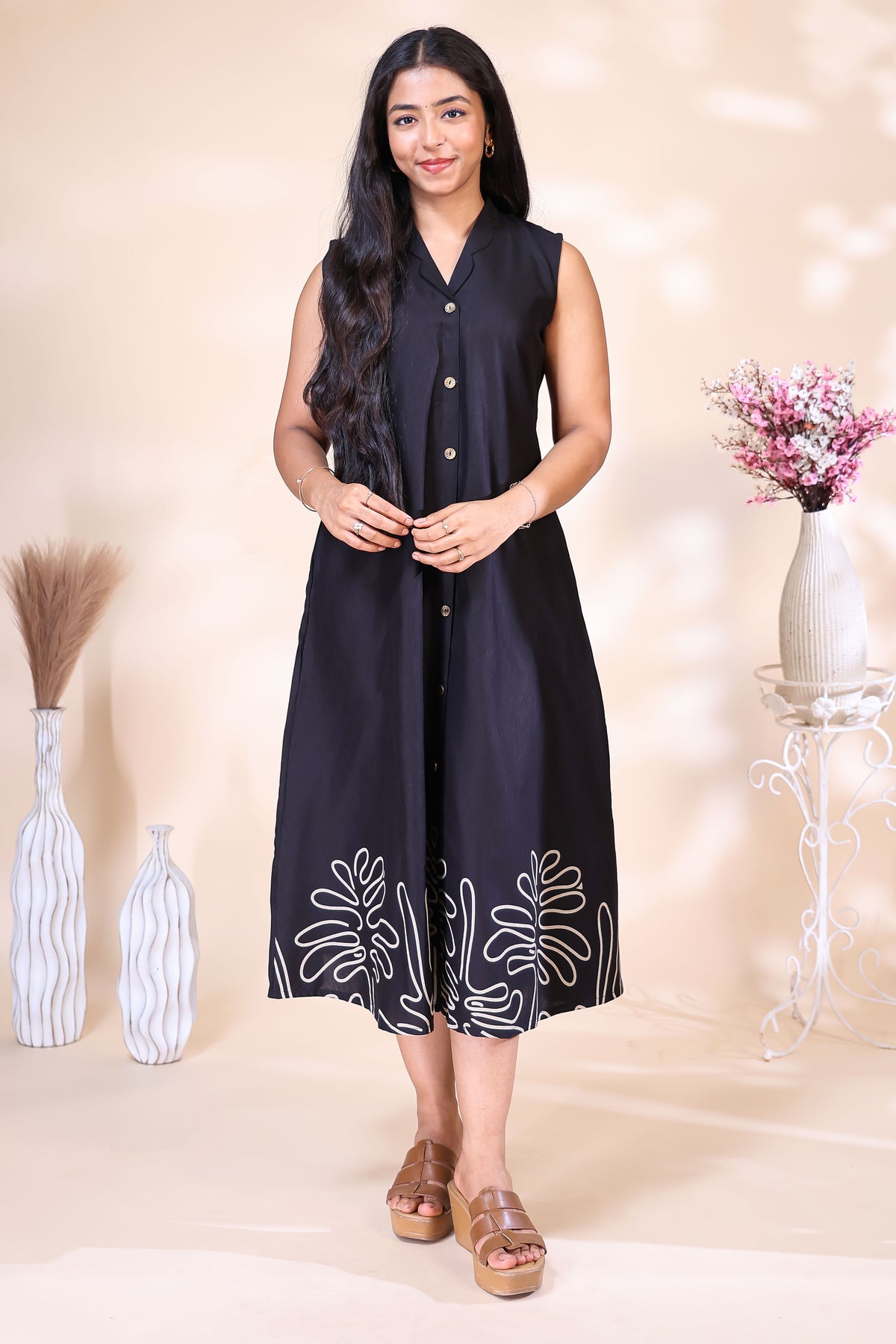 Elegant Black Sleeveless Dress with Abstract Floral Border Embroidery