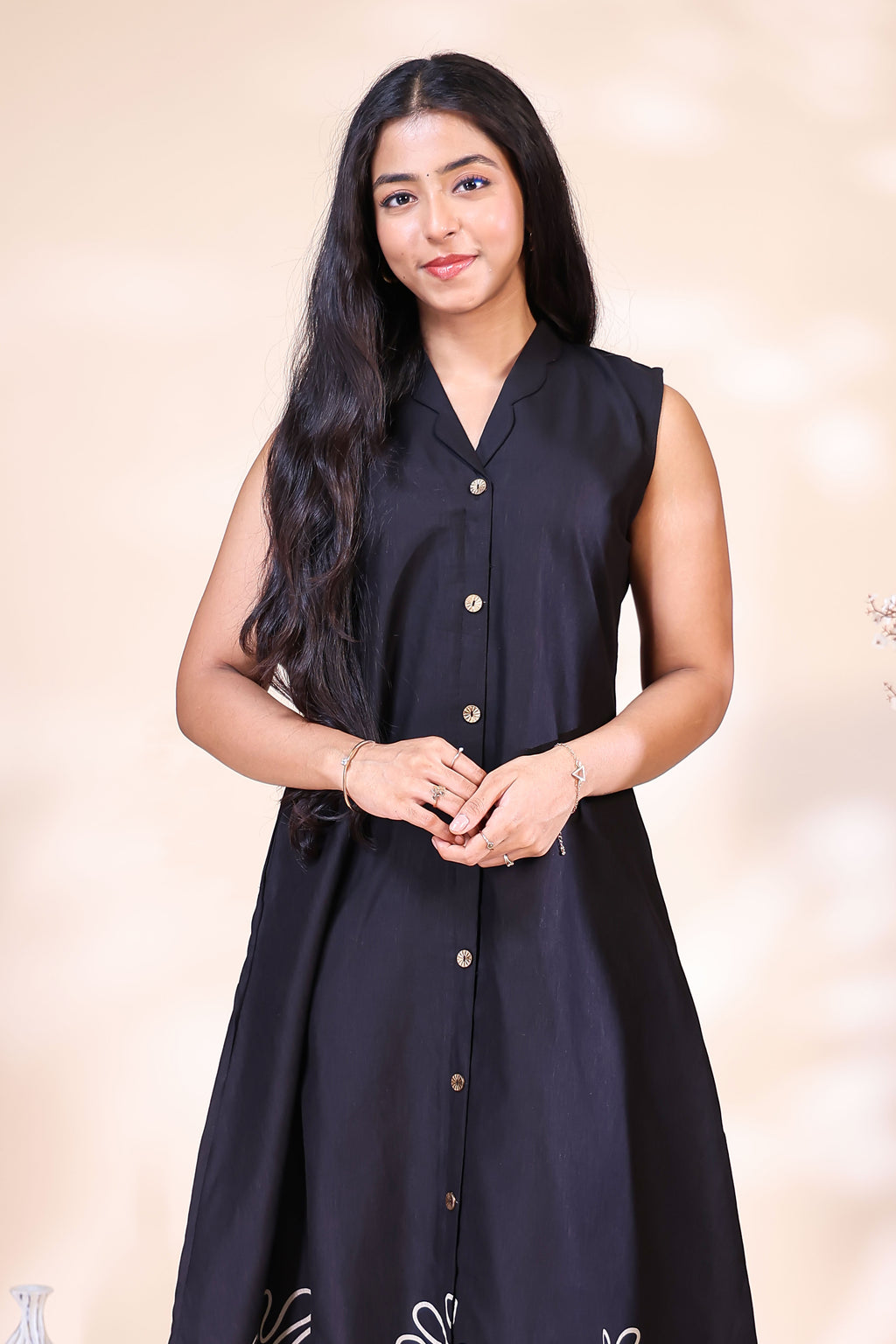 Elegant Black Sleeveless Dress with Abstract Floral Border Embroidery