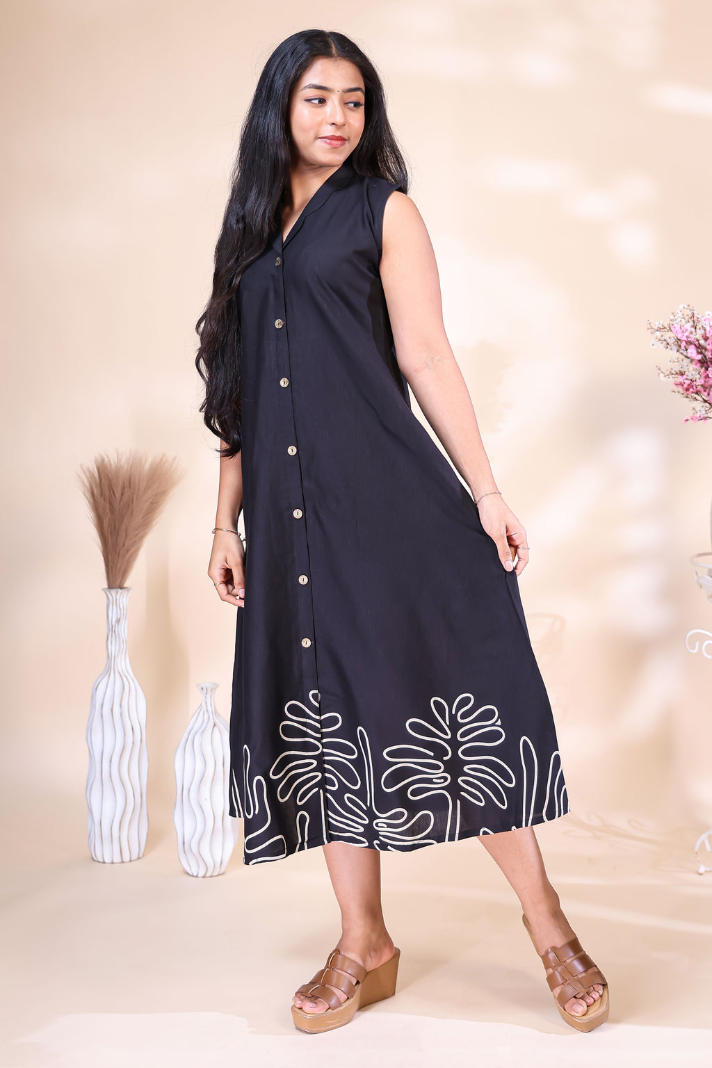 Elegant Black Sleeveless Dress with Abstract Floral Border Embroidery