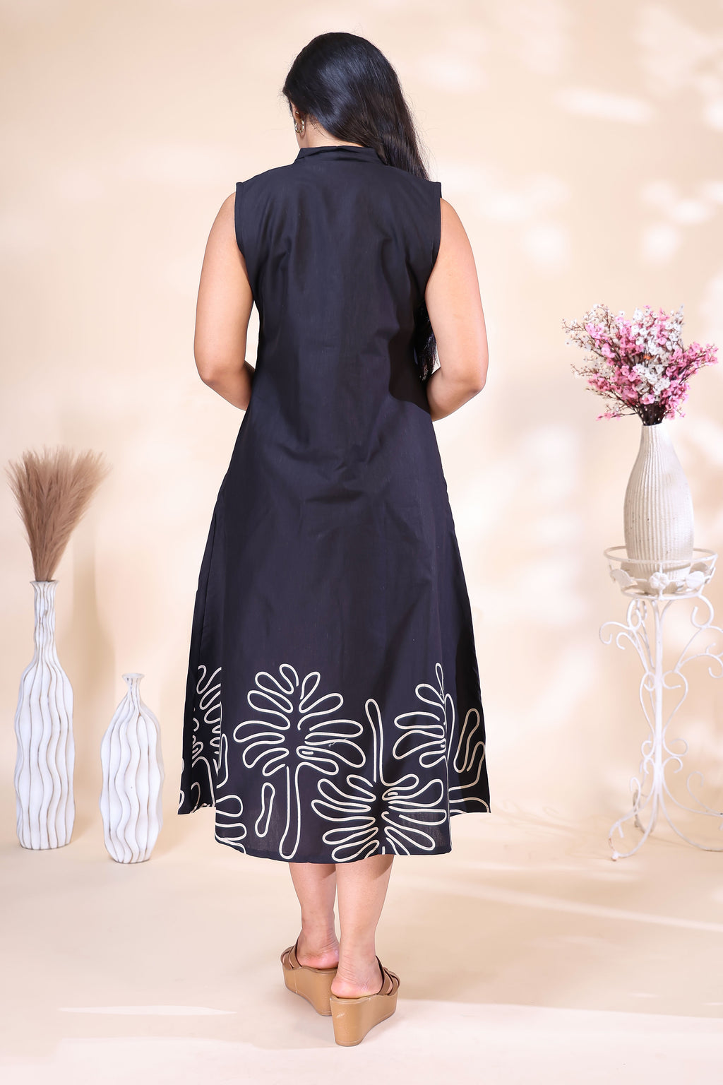 Elegant Black Sleeveless Dress with Abstract Floral Border Embroidery