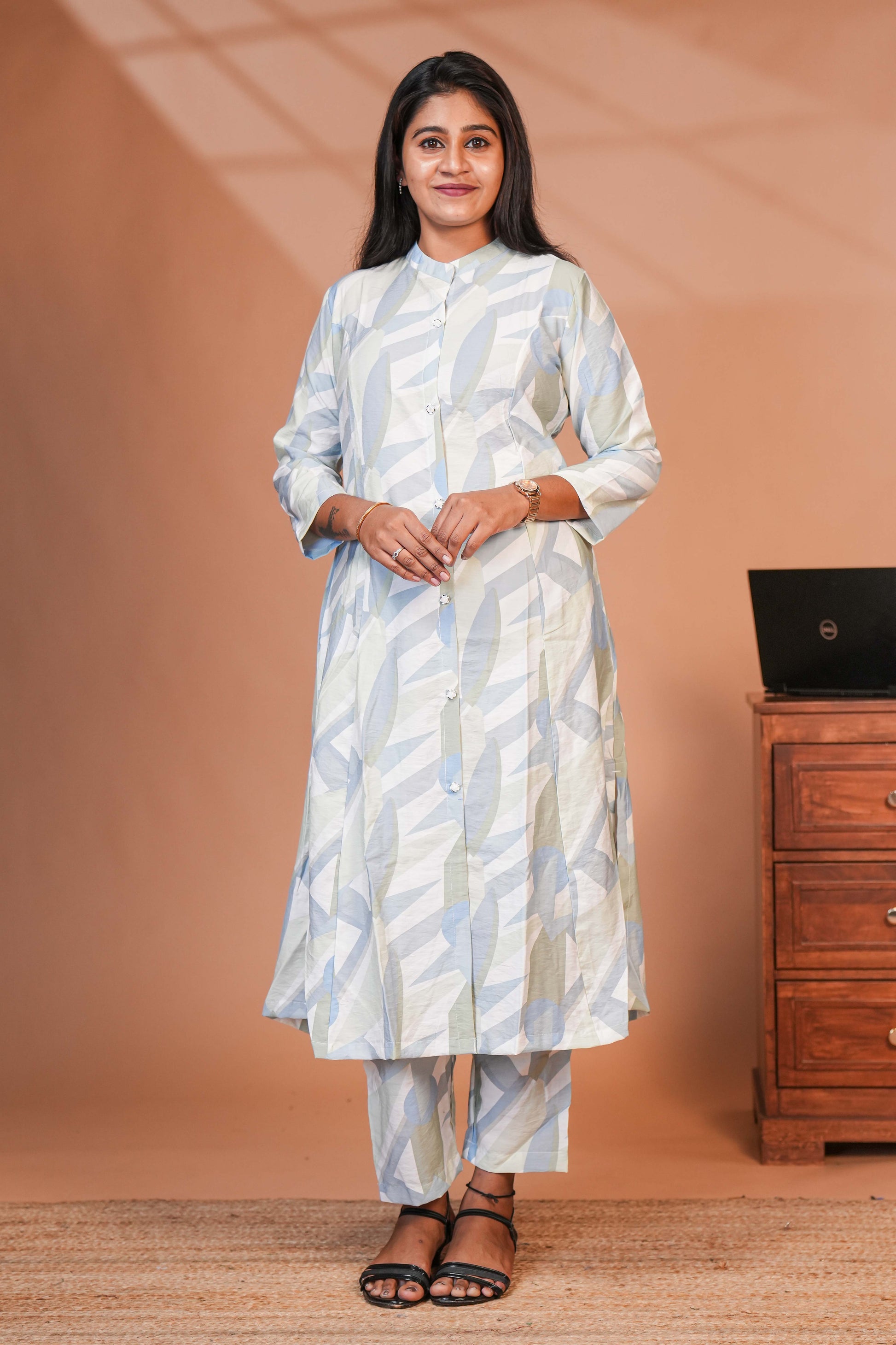 The Set is Anchored By a Longline, Shirt-Style Kurta That Features a Structured