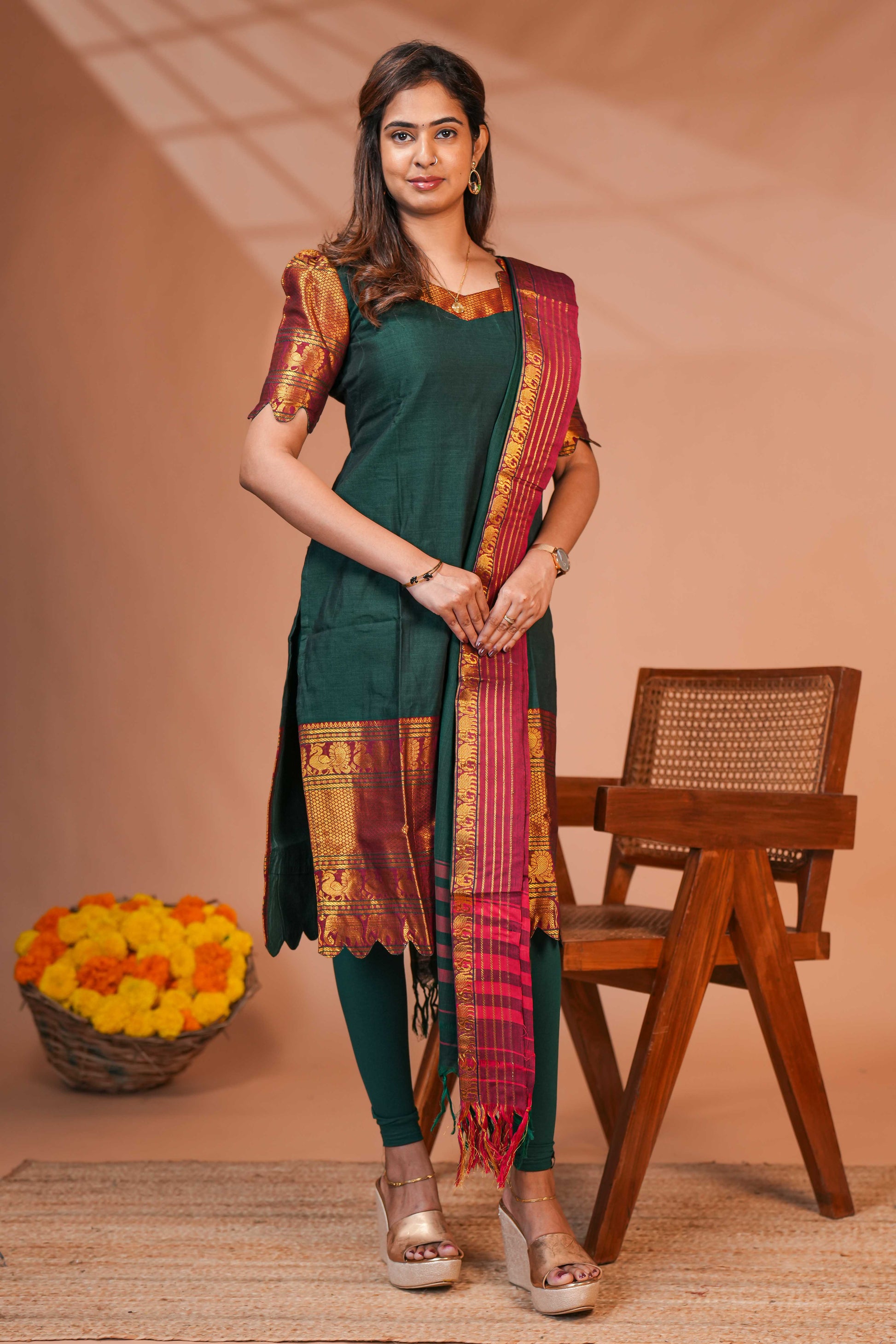 The Combination of Green, Maroon, and Gold Creates a Timeless Festive Palette