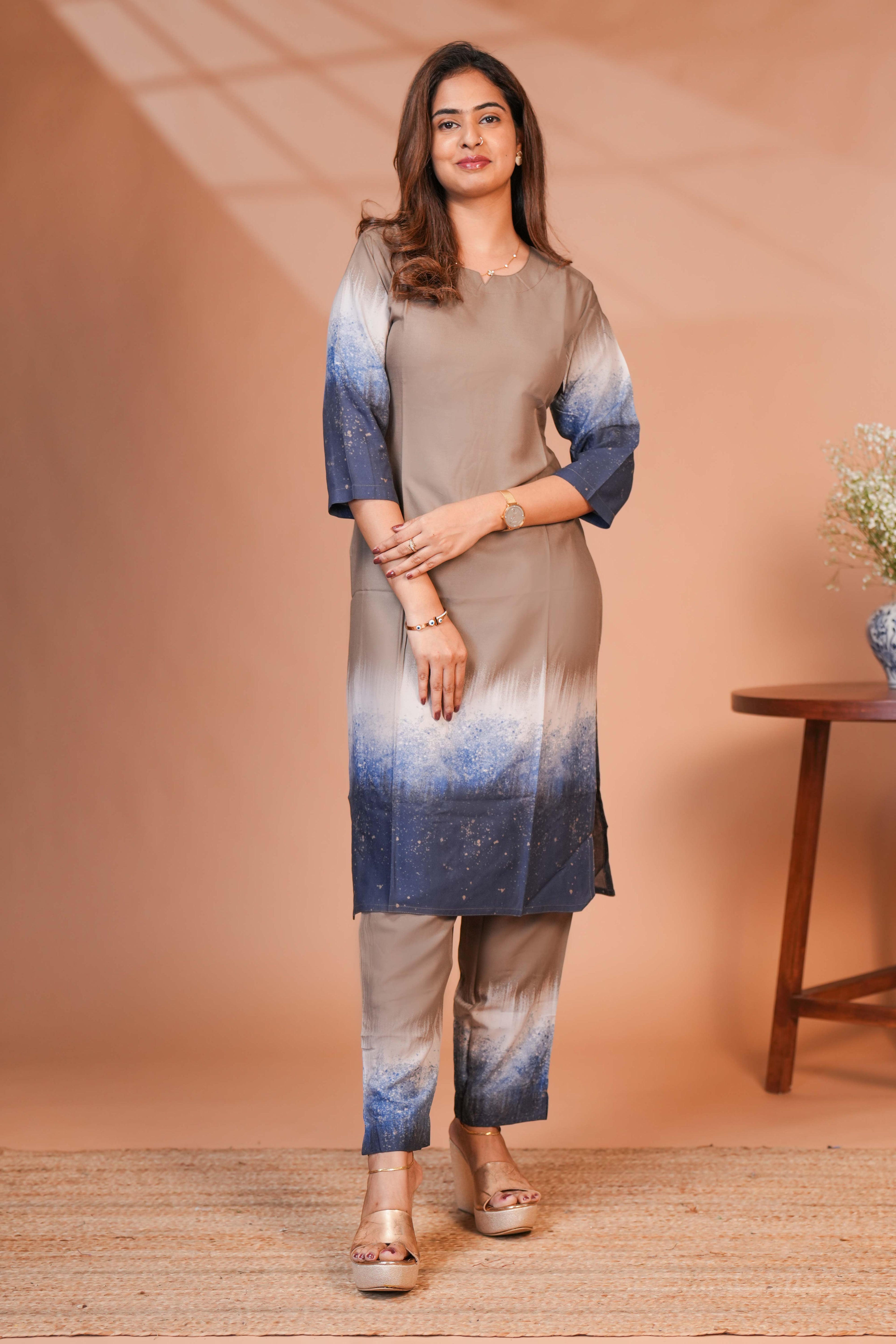 A muted Taupe/mocha brown at the top to a vibrant cobalt and navy blue