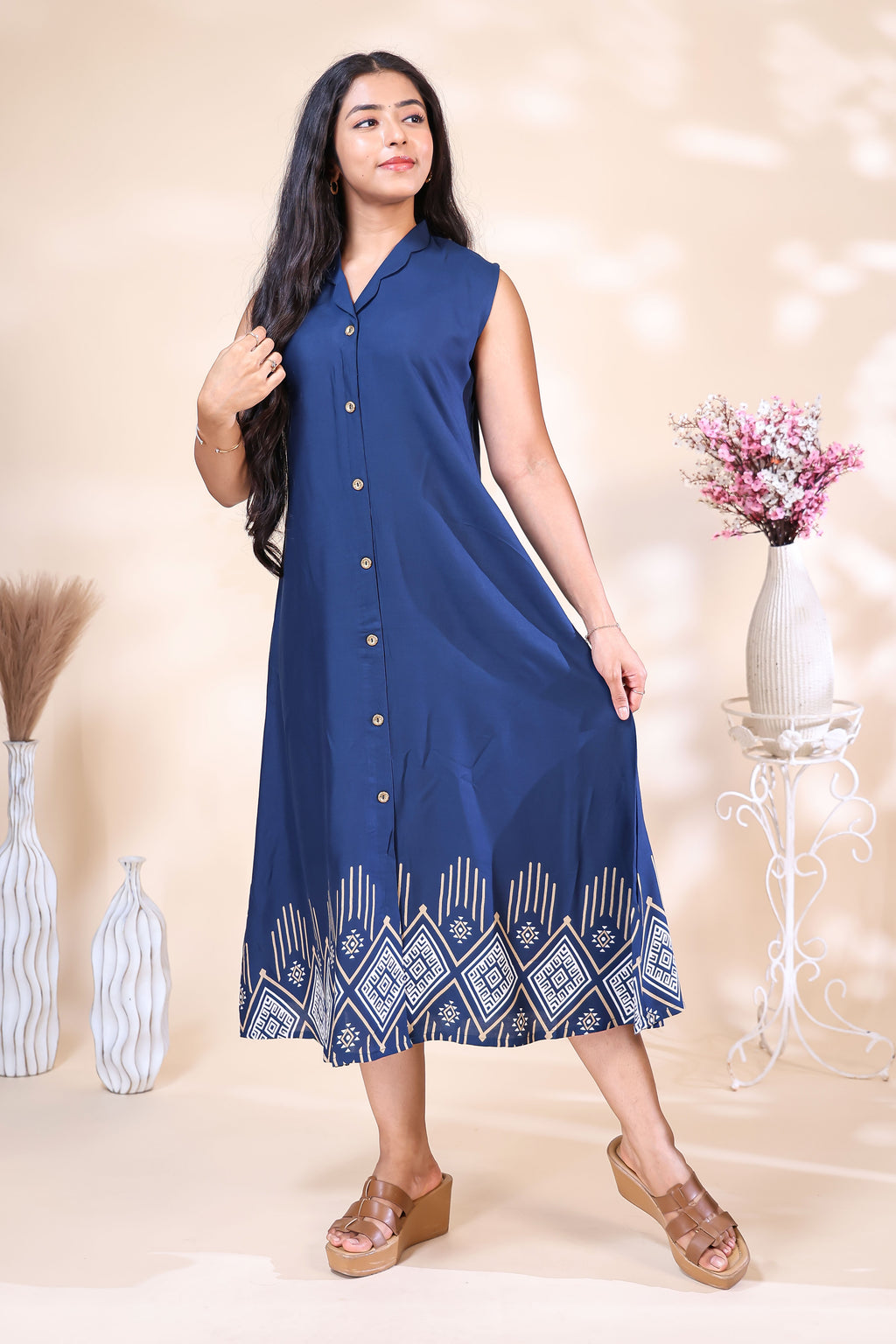 Elegant Navy Blue Dress with Geometric Hem Print