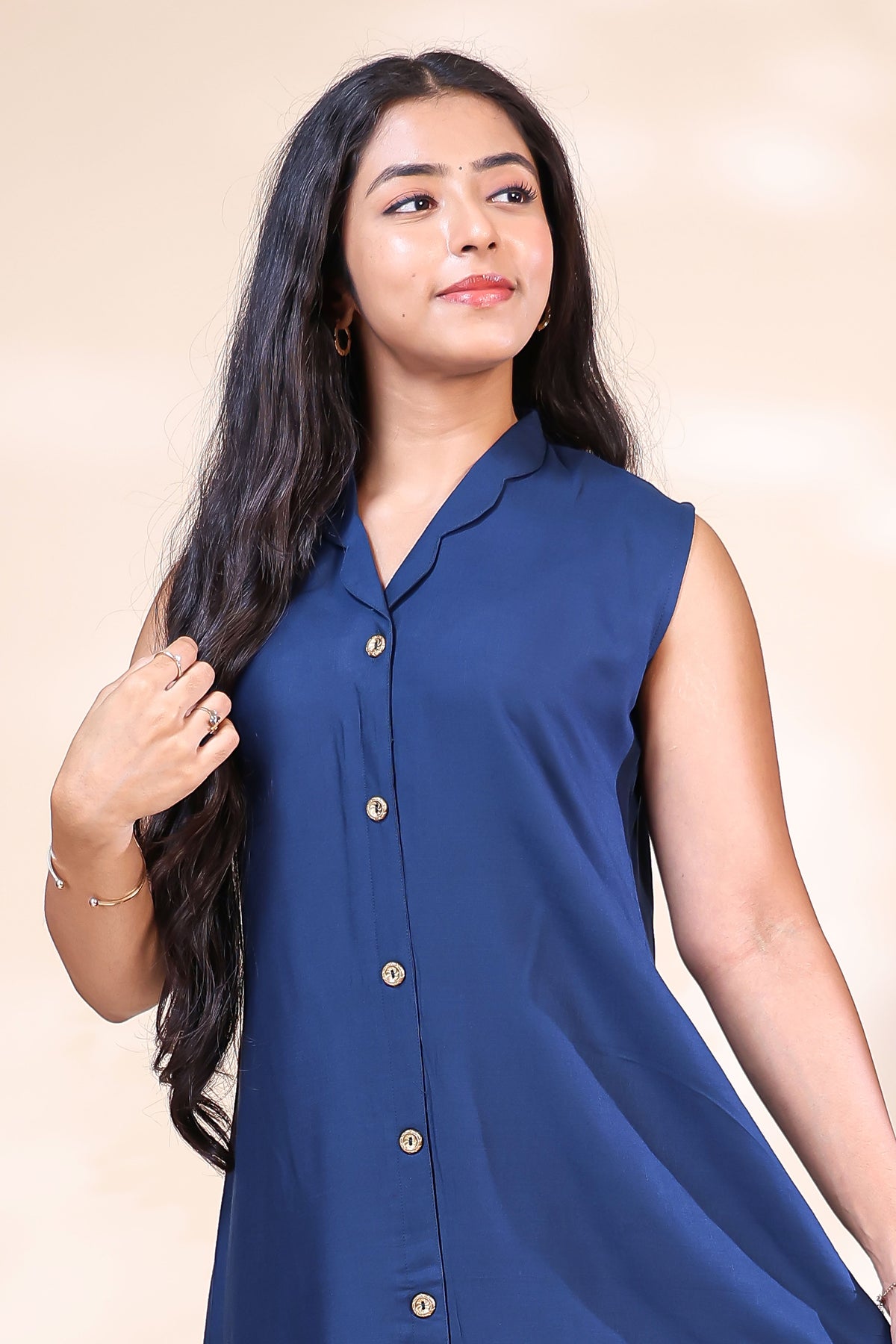 Elegant Navy Blue Dress with Geometric Hem Print