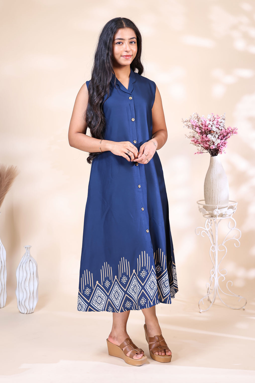 Elegant Navy Blue Dress with Geometric Hem Print