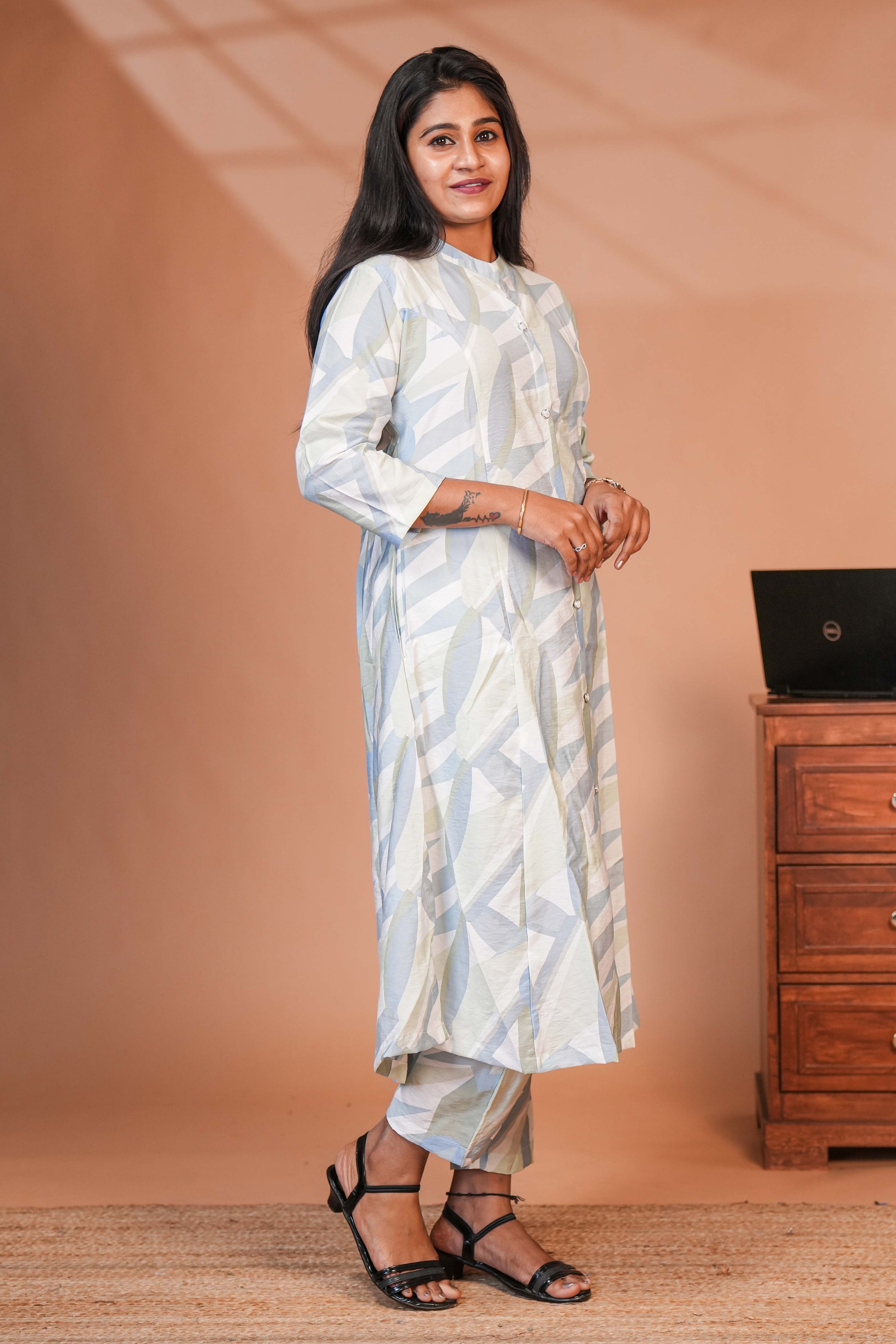 The Set is Anchored By a Longline, Shirt-Style Kurta That Features a Structured