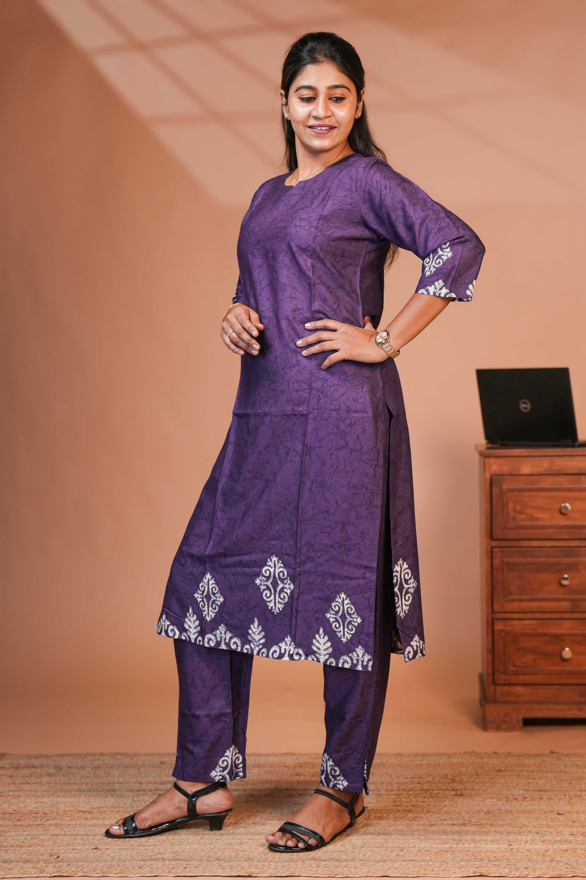 This Elegant Ethnic Set Features a Rich Royal Purple Kurta and Bottom,
