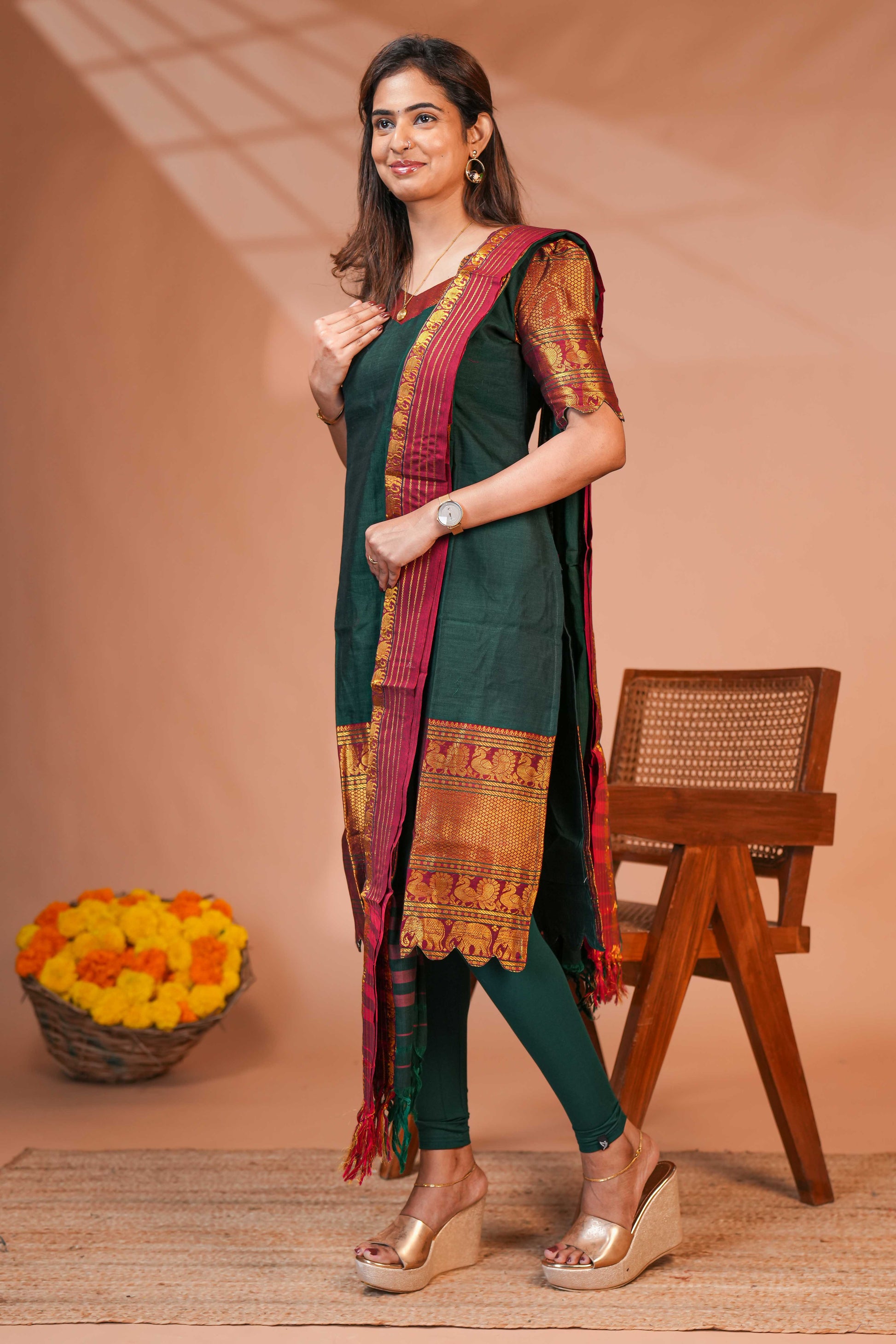 The Combination of Green, Maroon, and Gold Creates a Timeless Festive Palette