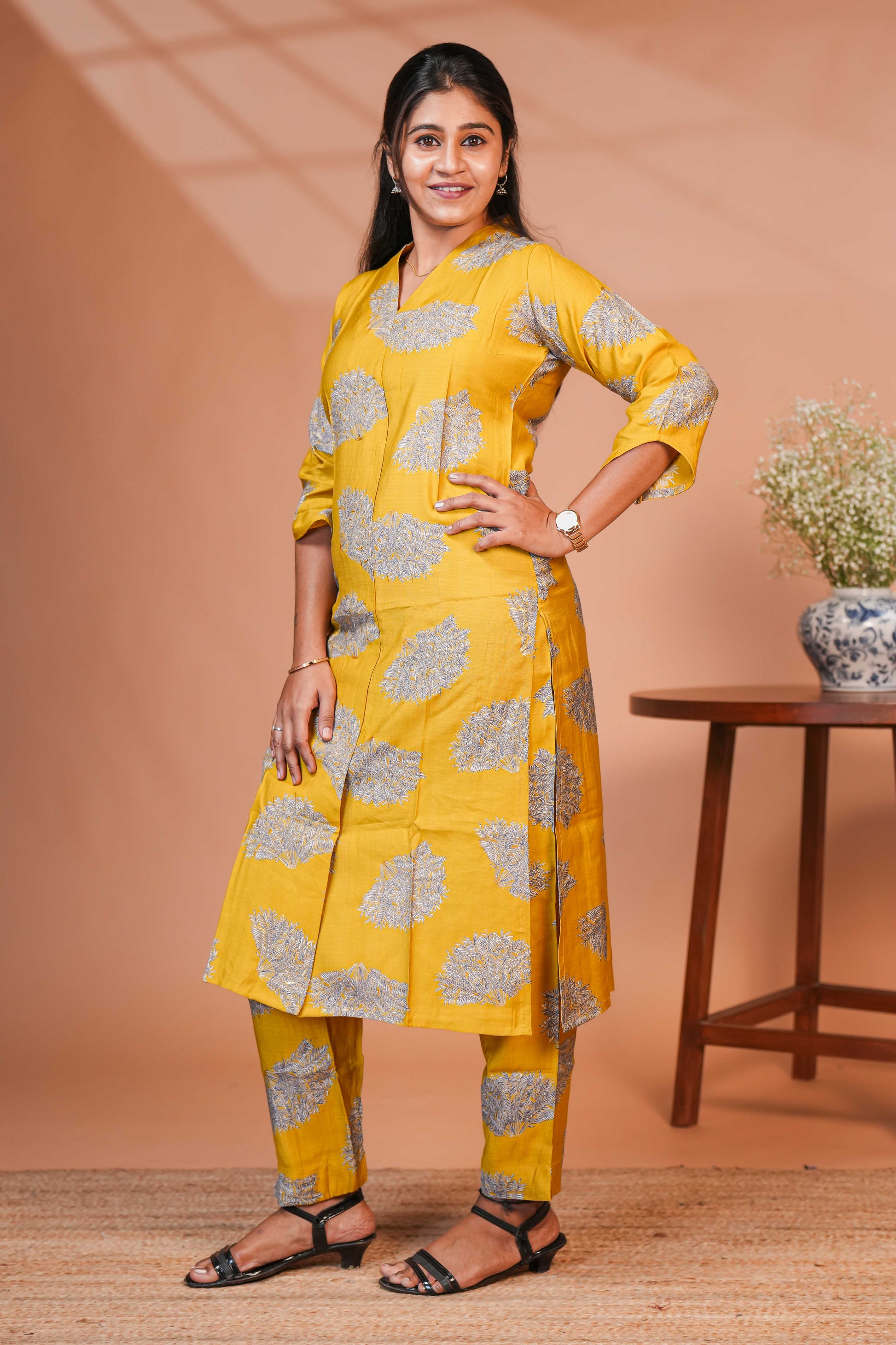 Coordinated Kurta–Pant Set  Color: Mustard Yellow Base With Silver-Grey Floral Block Print  Kurta:
