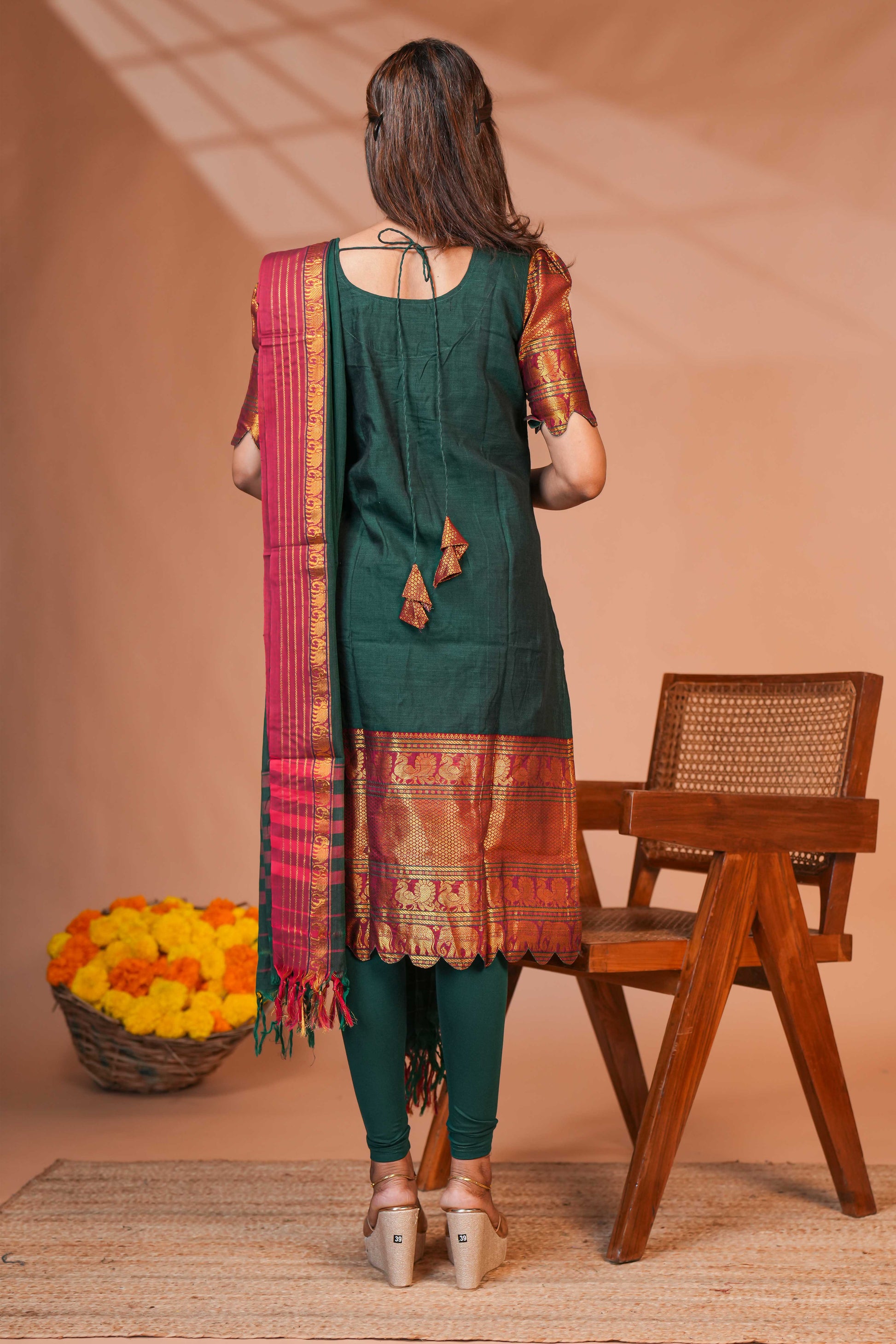 The Combination of Green, Maroon, and Gold Creates a Timeless Festive Palette