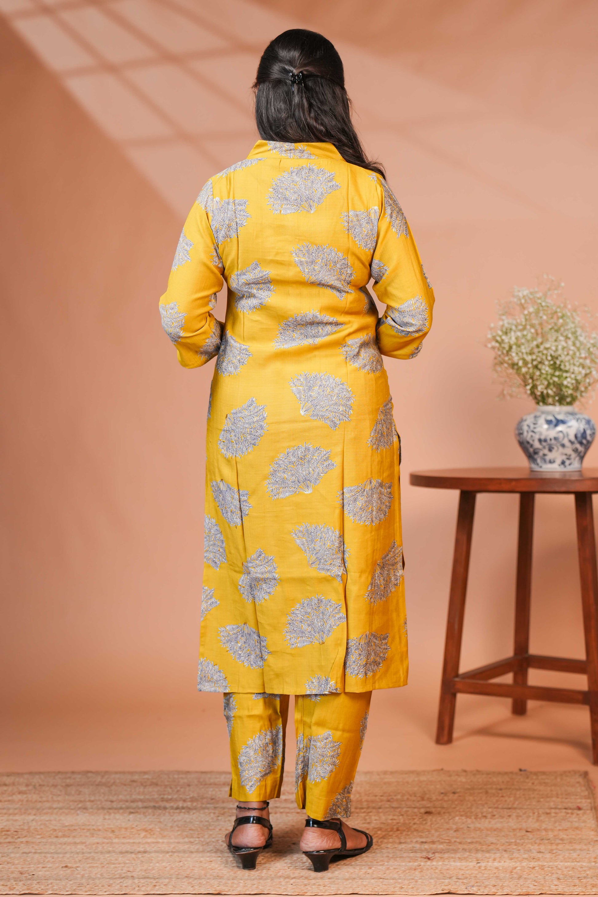 Coordinated Kurta–Pant Set  Color: Mustard Yellow Base With Silver-Grey Floral Block Print  Kurta:
