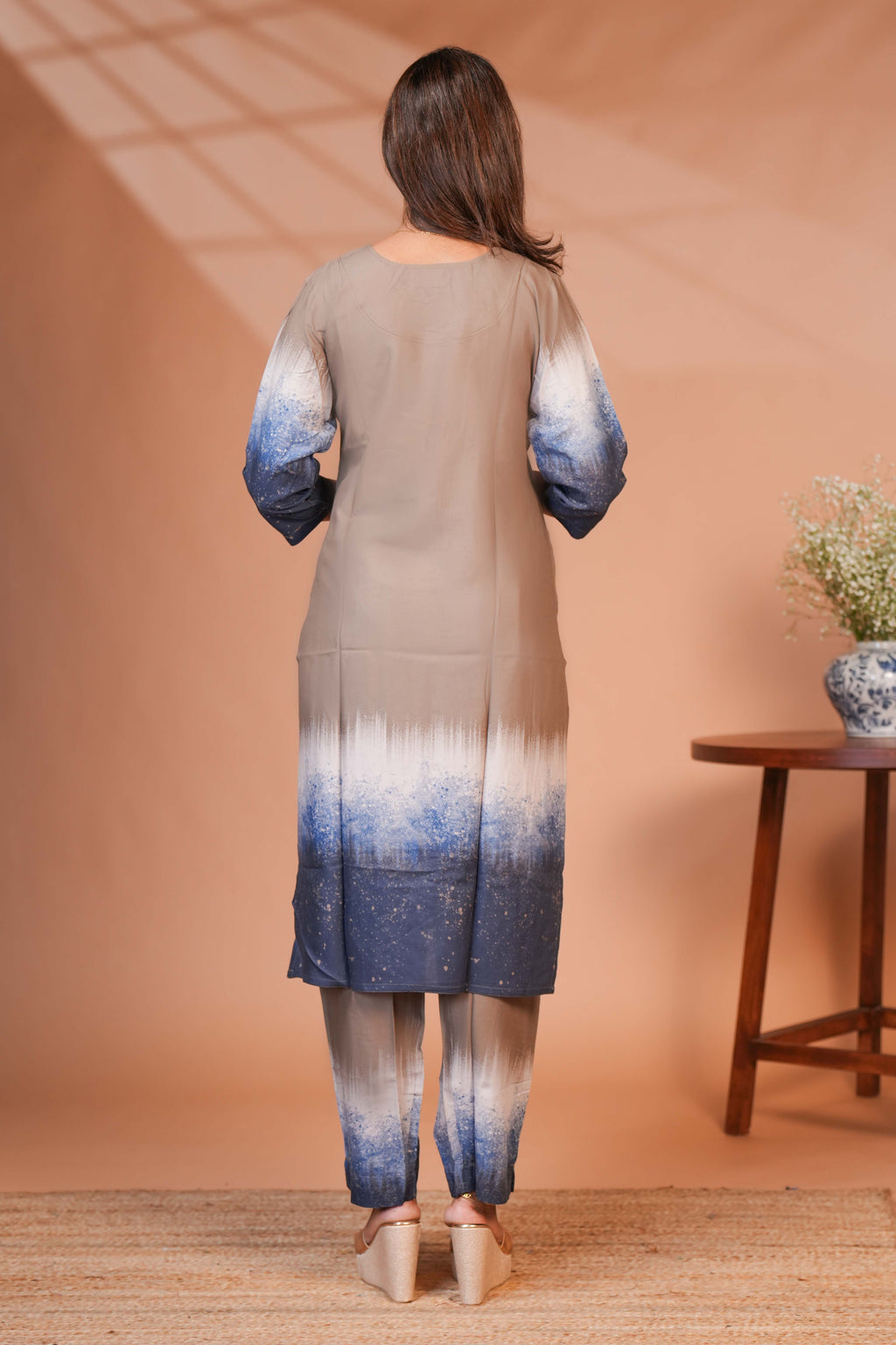 A muted Taupe/mocha brown at the top to a vibrant cobalt and navy blue