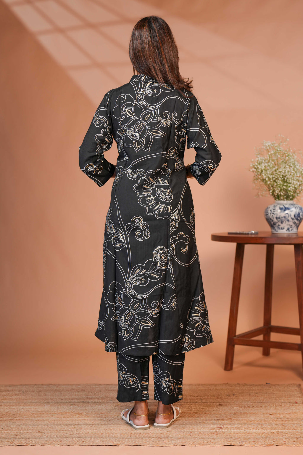 The Model is Wearing a Contemporary Two-Piece Ethnic Co-Ord Set in a Deep Midnight Black.