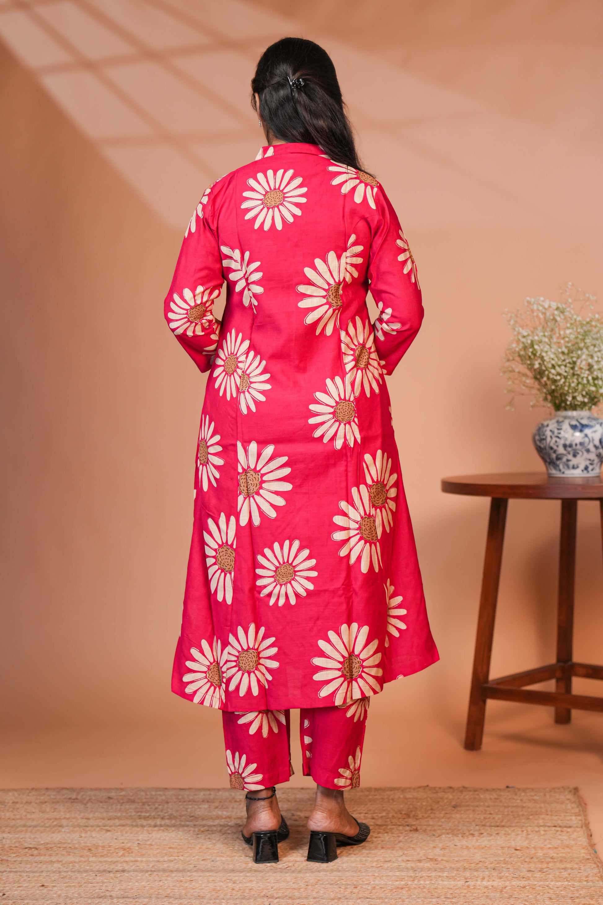 A Deep Black Base With Large, Rustic-Toned Botanical Motifs in Rust, Mocha, and Beige Botanical Prints.