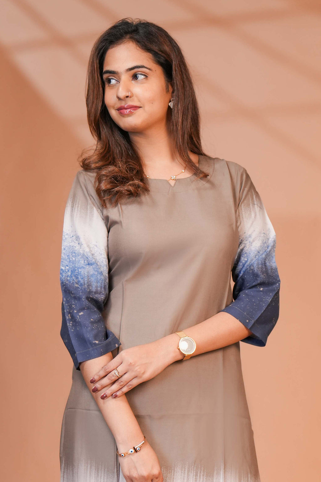 A muted Taupe/mocha brown at the top to a vibrant cobalt and navy blue