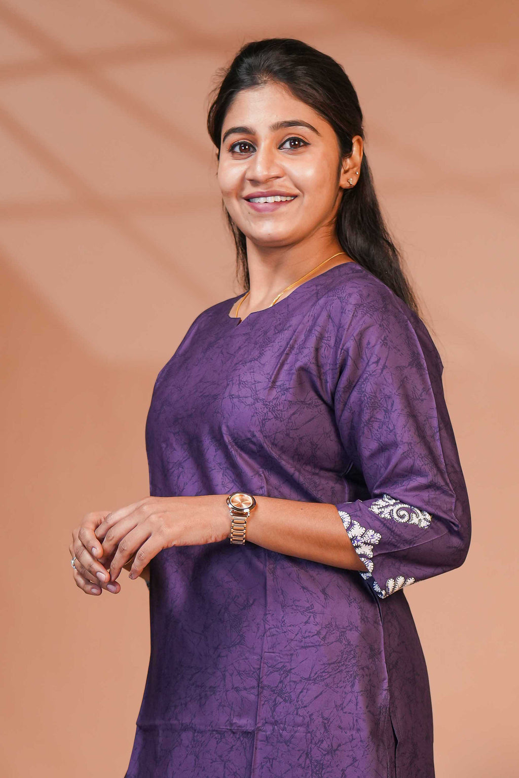 This Elegant Ethnic Set Features a Rich Royal Purple Kurta and Bottom,