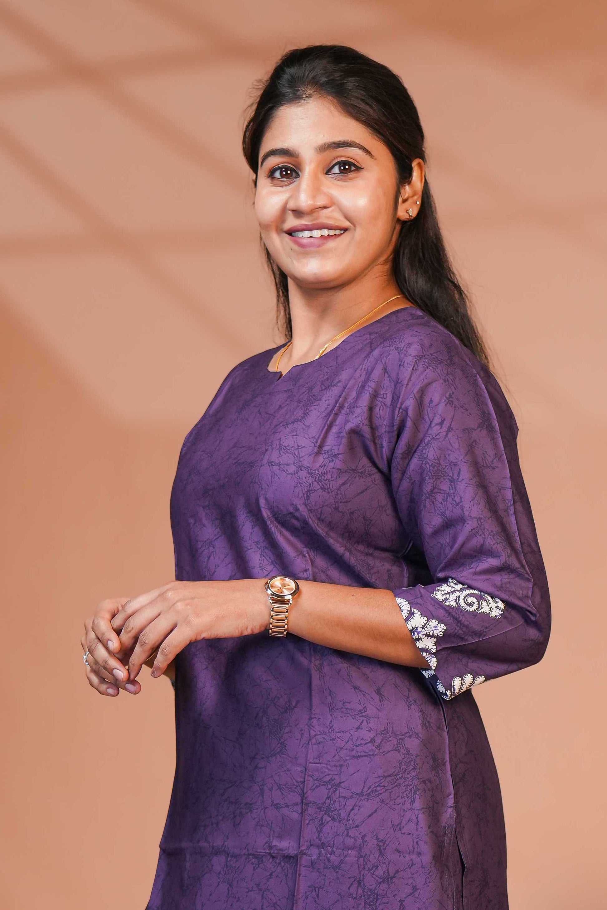 This Elegant Ethnic Set Features a Rich Royal Purple Kurta and Bottom,