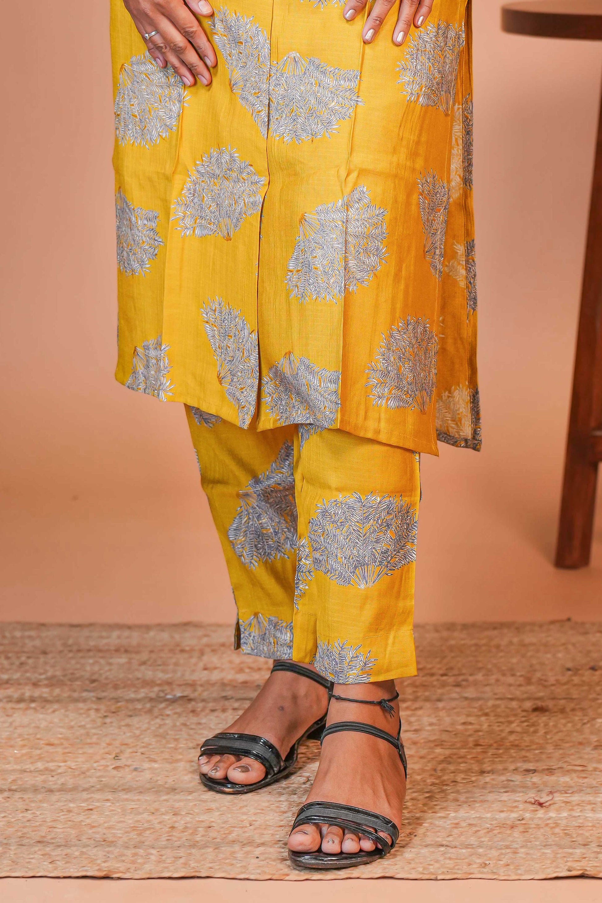 Coordinated Kurta–Pant Set  Color: Mustard Yellow Base With Silver-Grey Floral Block Print  Kurta: