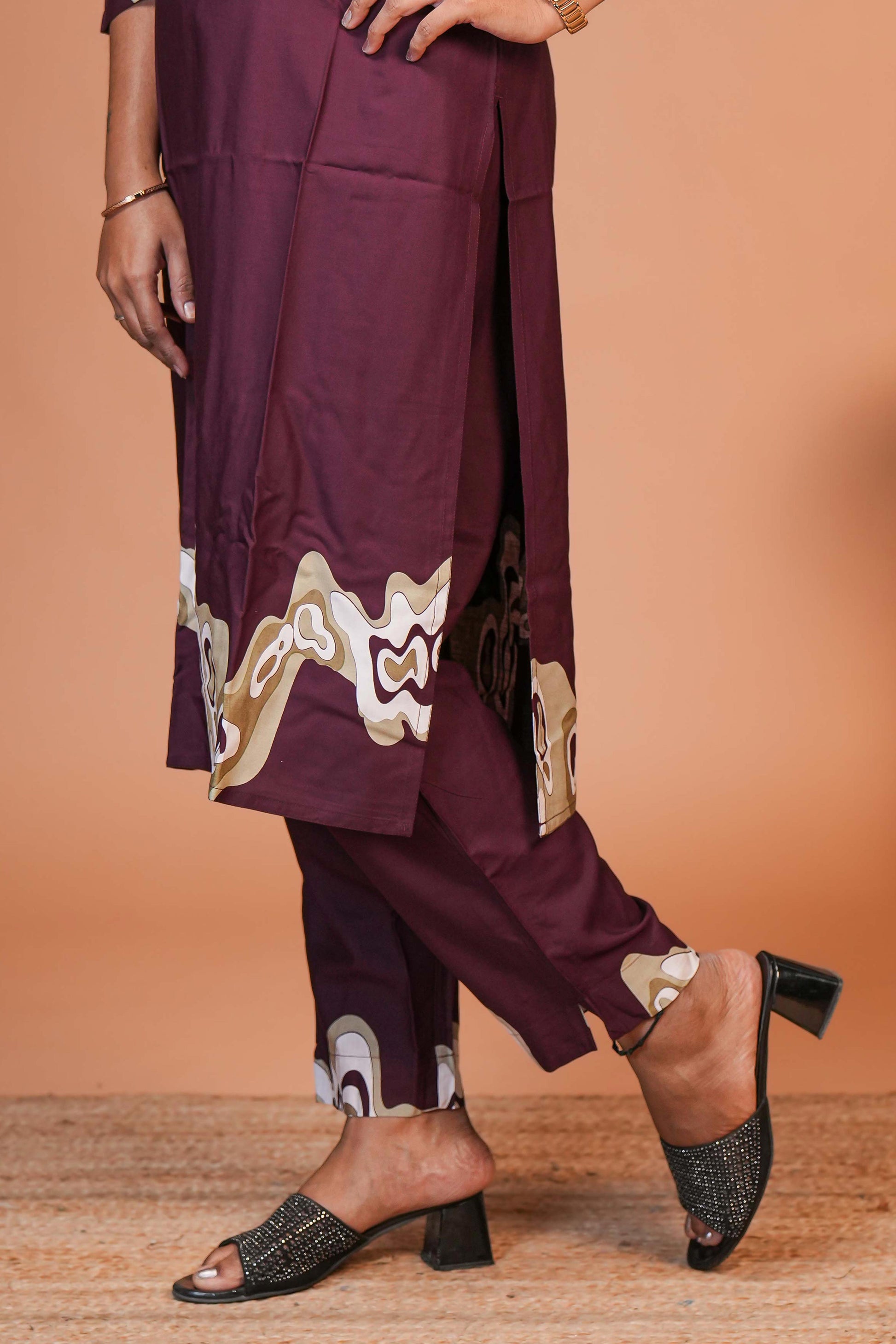 The Outfit Features a Rich Solid Wine-Maroon Base Colour Co- Ord set.